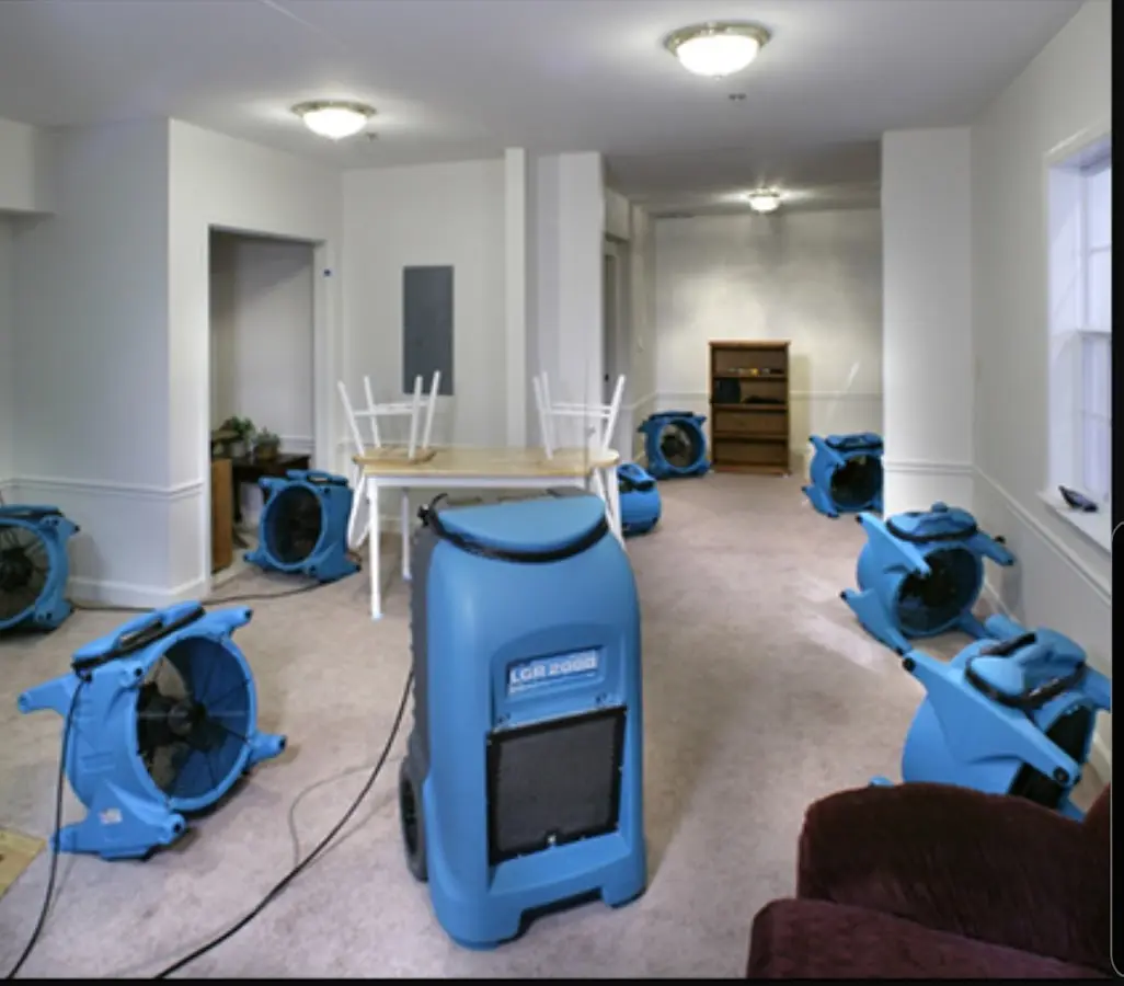 Air movers and dehumidifier setup for Water Extraction & Removal in Oronoko